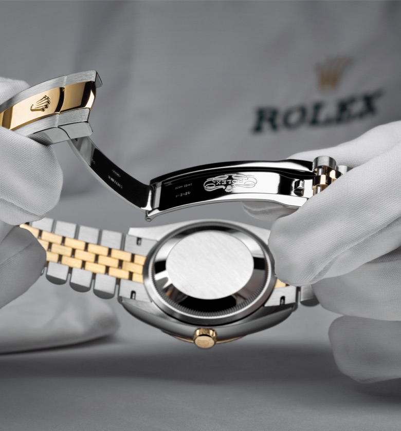 Rolex horloge witte handschoenen